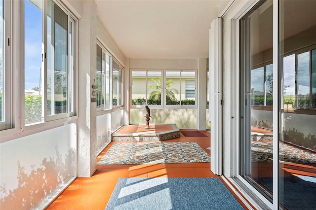 sunroom / solarium with a healthy amount of sunlight