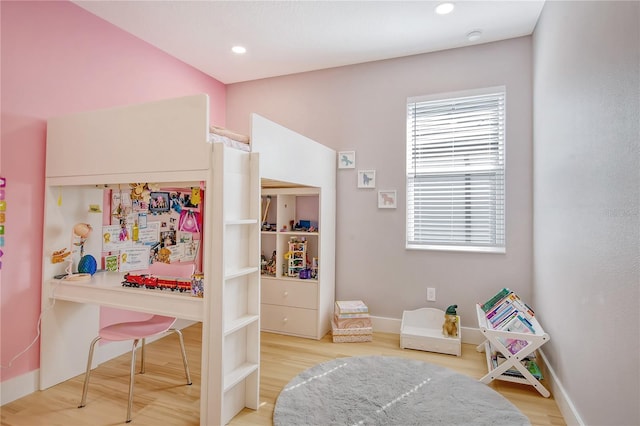 recreation room featuring light hardwood / wood-style flooring