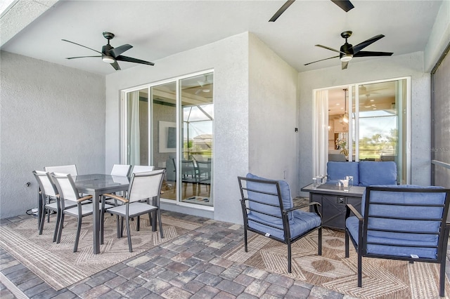 view of patio / terrace featuring ceiling fan