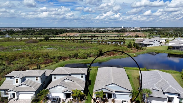 aerial view featuring a water view