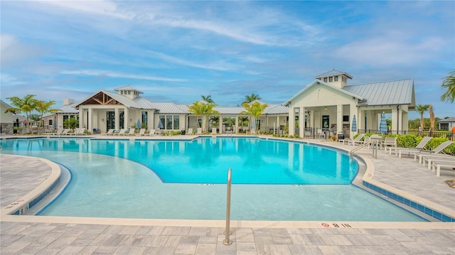 view of swimming pool featuring a patio