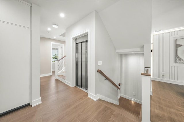 hall featuring light hardwood / wood-style flooring