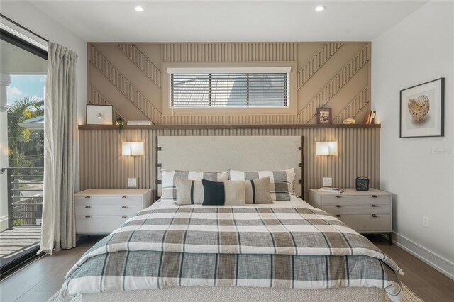 bedroom with wood-type flooring