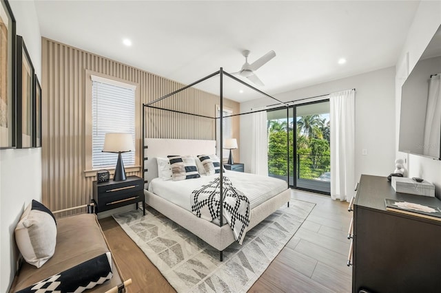 bedroom with ceiling fan and access to exterior