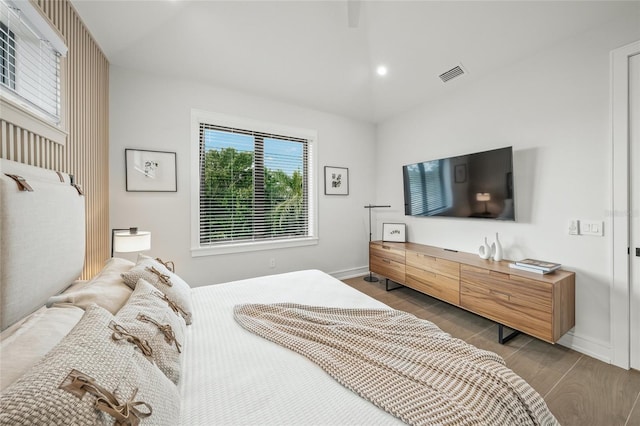 bedroom featuring dark hardwood / wood-style flooring