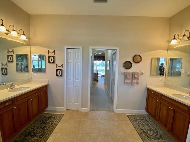 bathroom with vanity and tile patterned floors