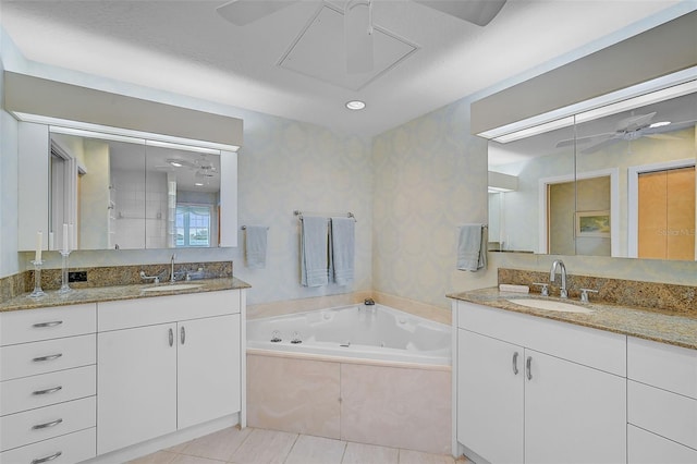 bathroom with tile patterned flooring, vanity, ceiling fan, and plus walk in shower