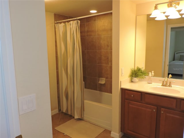 bathroom featuring shower / tub combo with curtain, vanity, and tile patterned floors