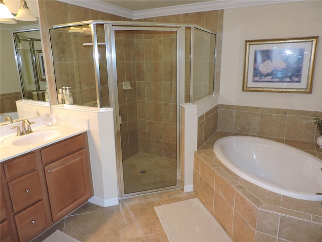 bathroom with ornamental molding, tile patterned flooring, independent shower and bath, and vanity