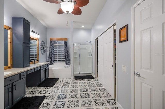 bathroom featuring vanity, ceiling fan, and plus walk in shower