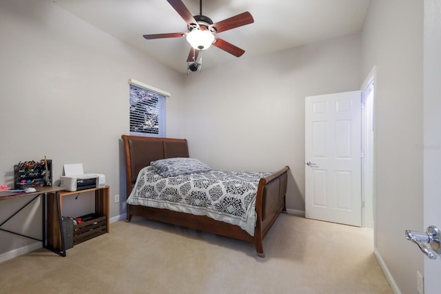 bedroom with light colored carpet and ceiling fan