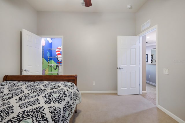 carpeted bedroom featuring ceiling fan