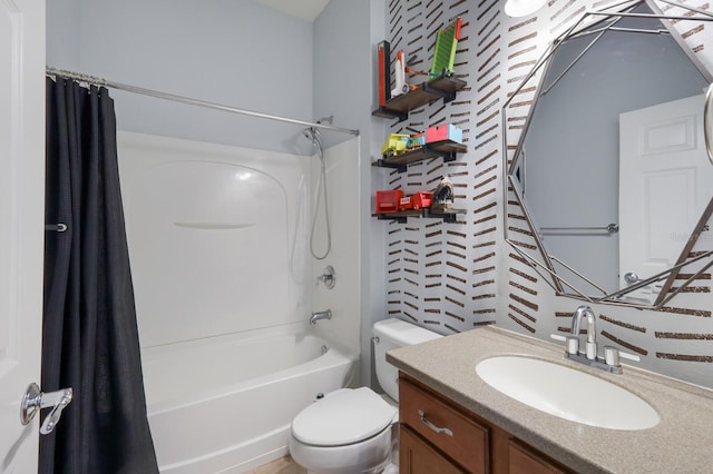 full bathroom featuring vanity, toilet, and shower / tub combo with curtain