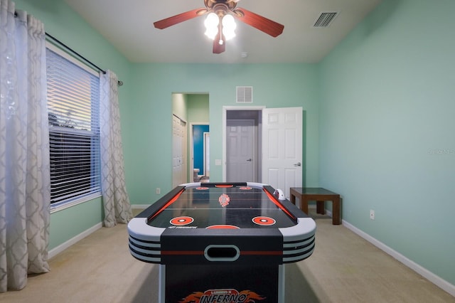 playroom featuring carpet and ceiling fan