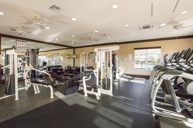 workout area with ornamental molding