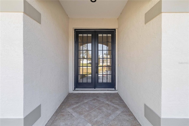 view of exterior entry with french doors