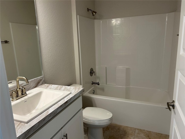 full bathroom featuring shower / tub combination, vanity, toilet, and tile patterned floors