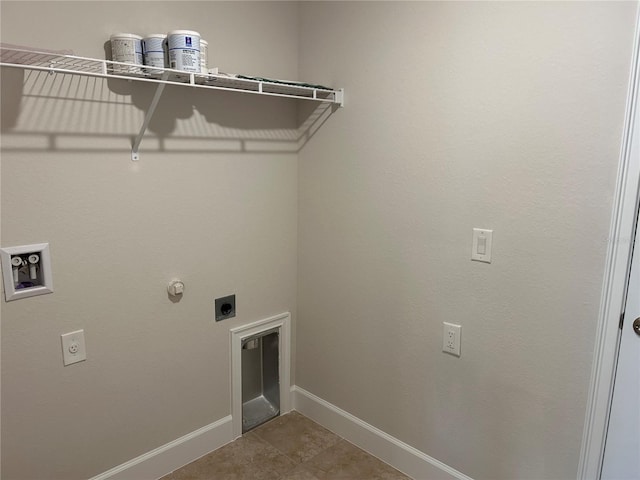 clothes washing area with hookup for a washing machine, gas dryer hookup, hookup for an electric dryer, and light tile patterned floors