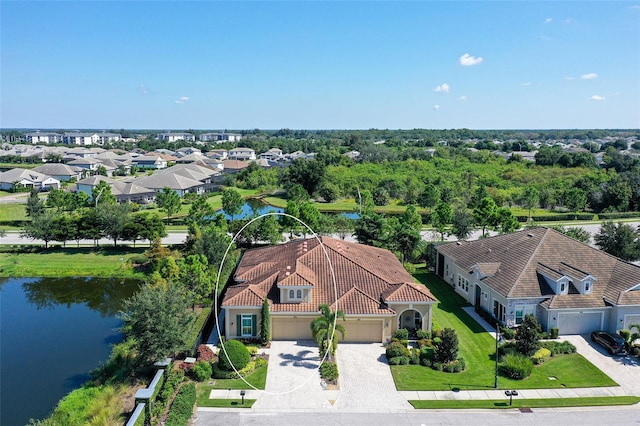 drone / aerial view with a water view