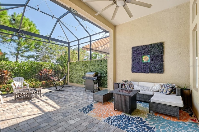 view of patio featuring an outdoor living space, area for grilling, a lanai, and ceiling fan