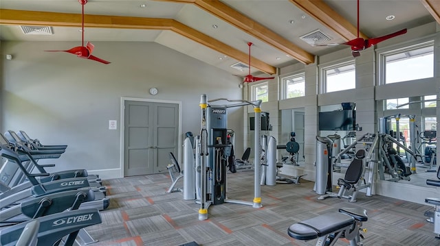 gym with carpet flooring and high vaulted ceiling