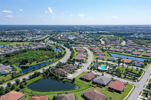 drone / aerial view with a water view