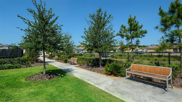 view of community featuring a lawn