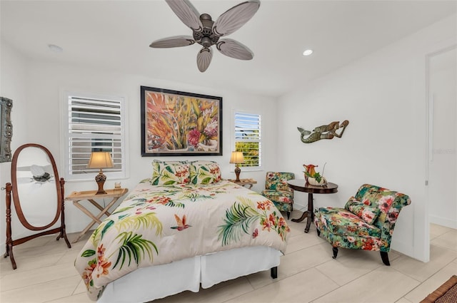 bedroom featuring ceiling fan and light tile patterned floors