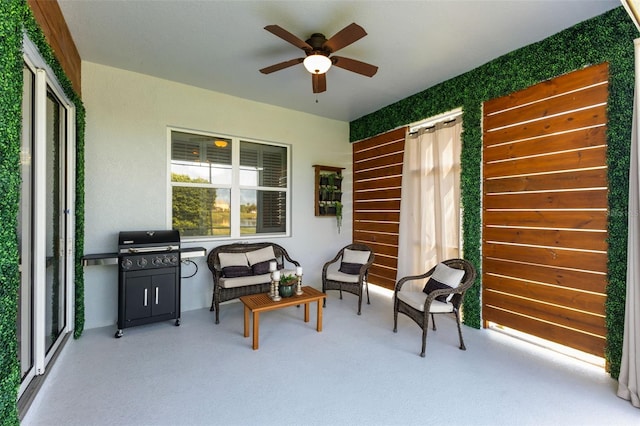 view of patio with grilling area and ceiling fan