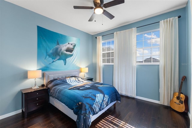 bedroom featuring ceiling fan and dark hardwood / wood-style flooring