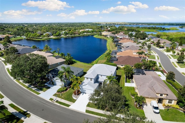 drone / aerial view with a water view