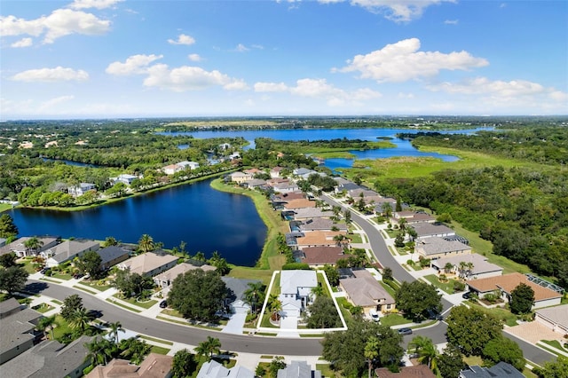 drone / aerial view featuring a water view