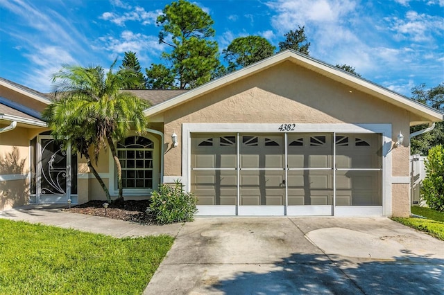 ranch-style house featuring a garage