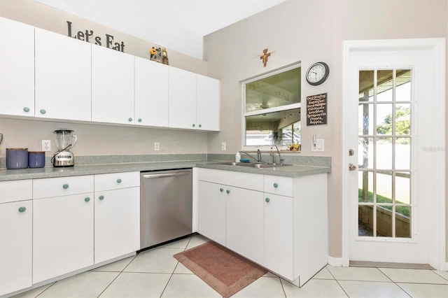 kitchen with white cabinets, dishwasher, sink, and a wealth of natural light