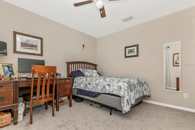 bedroom with light carpet and ceiling fan