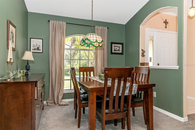 view of carpeted dining area