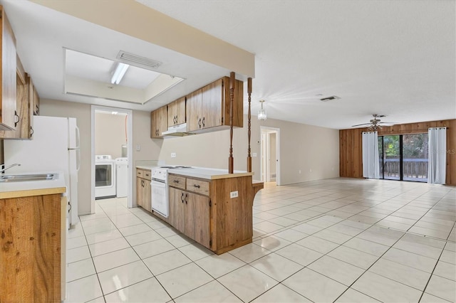 kitchen with ceiling fan, white range with electric cooktop, light tile patterned floors, and washer / clothes dryer