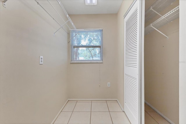 walk in closet featuring light tile patterned floors