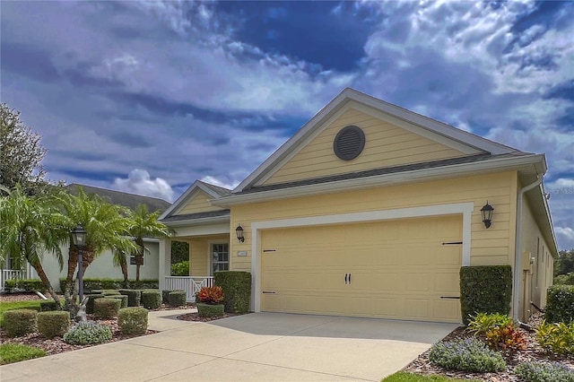 view of front of property featuring a garage