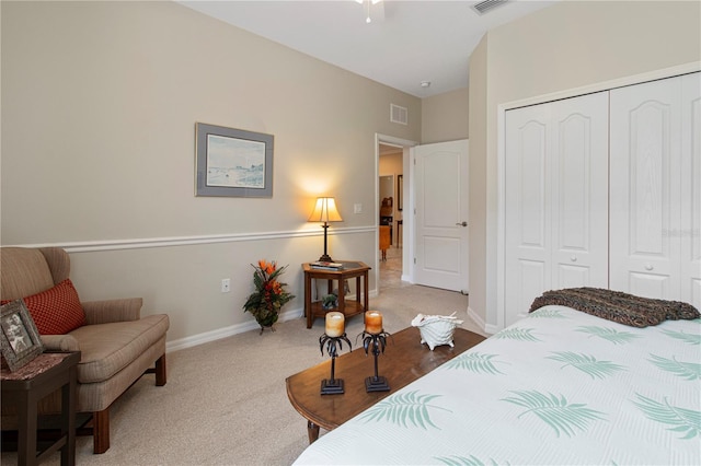 carpeted bedroom featuring a closet