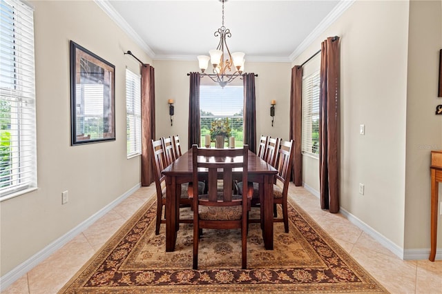 dining area with ornamental molding, a chandelier, light tile patterned floors, and a healthy amount of sunlight