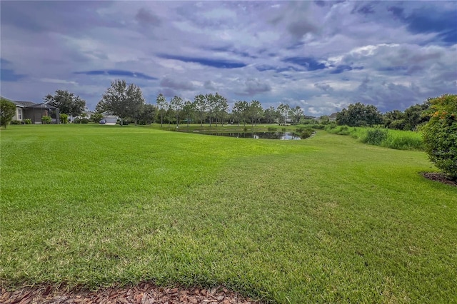 view of yard featuring a water view