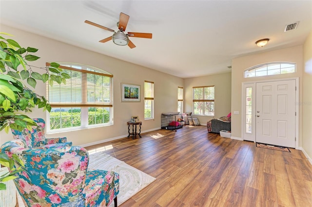 entrance foyer featuring ceiling fan and hardwood / wood-style flooring