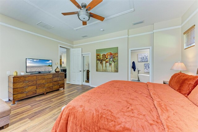 bedroom with ceiling fan and light hardwood / wood-style flooring