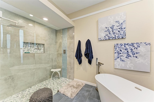 bathroom with tile patterned flooring and independent shower and bath