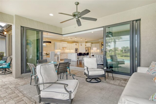 view of patio with ceiling fan