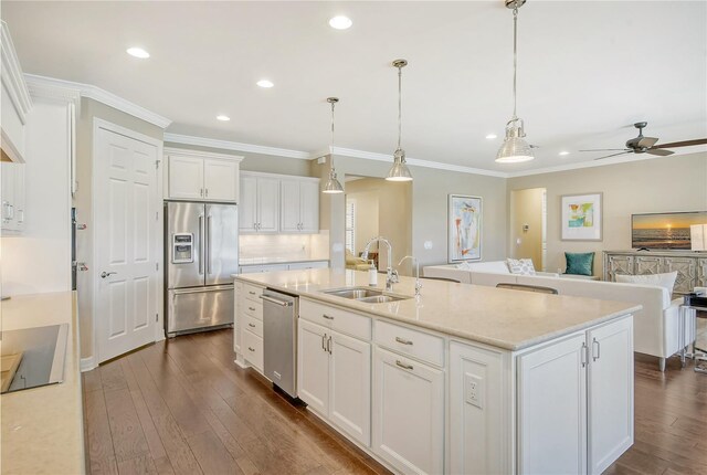 kitchen featuring ceiling fan, sink, dark wood-type flooring, white cabinetry, and appliances with stainless steel finishes