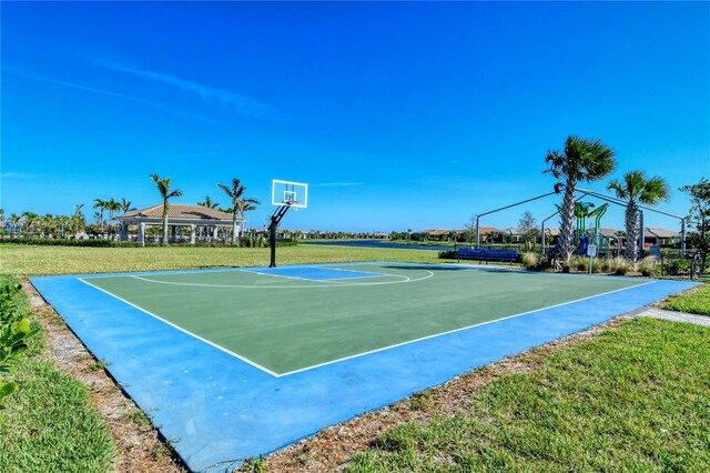 view of basketball court featuring a gazebo and a yard