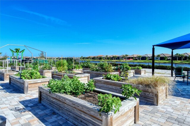 view of patio / terrace featuring a water view