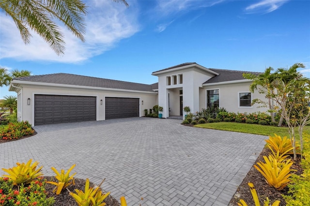 view of front of property featuring a garage